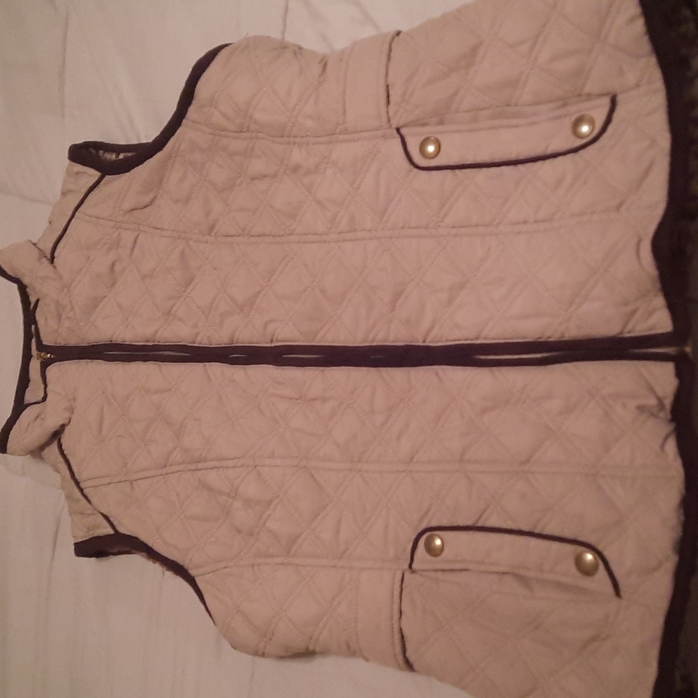 Weather proof vest NWOT fuzzy leopard print inside tan on outside brown trim